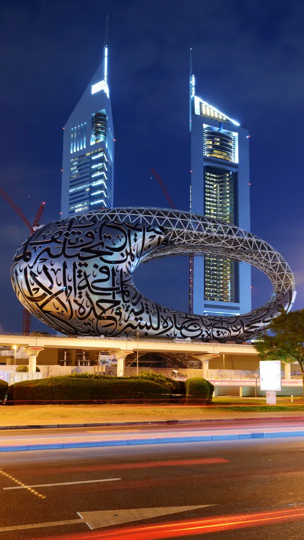External shot of the Museum of the Future in Dubai, timelapse photo taken at night